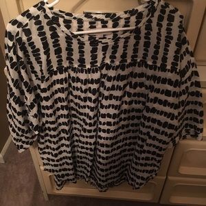 White and black polka dot blouse